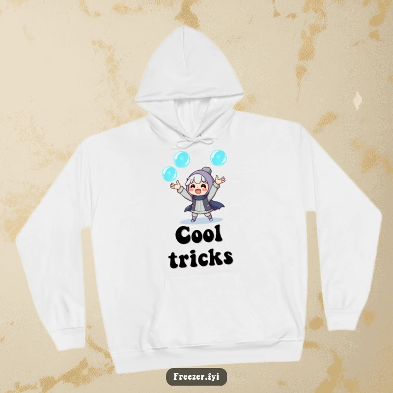 Funny hoodie depicting an excited character juggling three glowing ice orbs, offering warmth and a touch of magical winter performance.