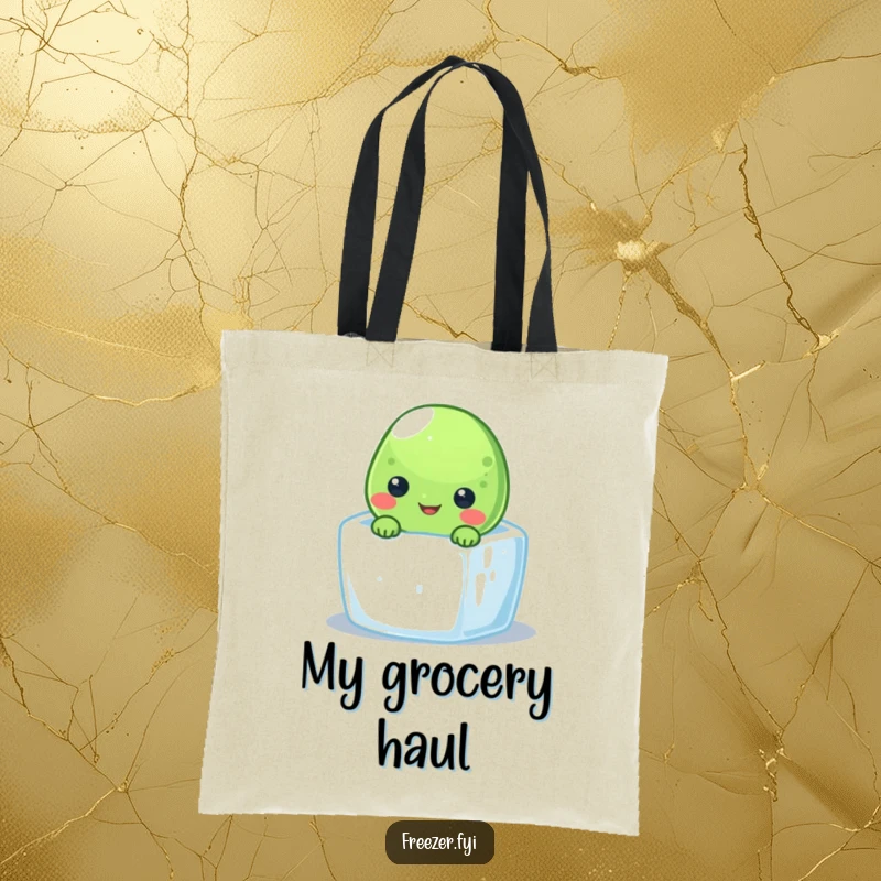 Funny frozen pea tote bag with a smiling character peeking from a tiny ice cube, perfect for carrying cool essentials.